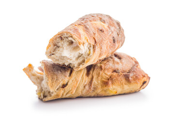 Crusty rustic baguette isolated on white table.