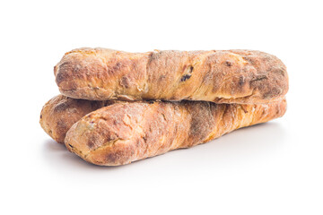 Crusty rustic baguette isolated on white table.
