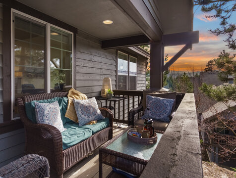 Front porch of house during sunset