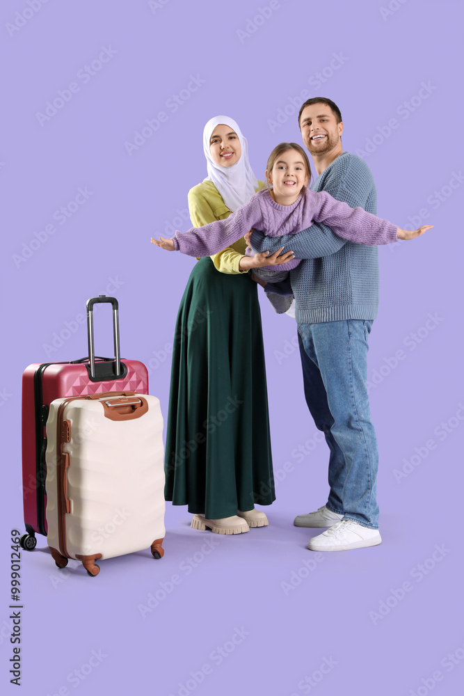 Poster Beautiful Muslim family with suitcases on lilac background. Travel concept