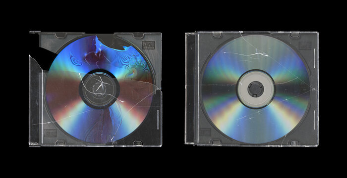 set of two cracked old music CD disc jewel case with compact disk and without cover in black background, y2k style	