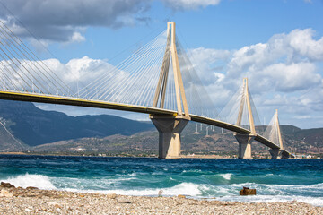 Rio–Antirrio Bridge over the sea in Greece.Rio–Antirrio Bridge is the world's longest multi-span cable-stayed bridge connecting mainland Greece to Peleponnese