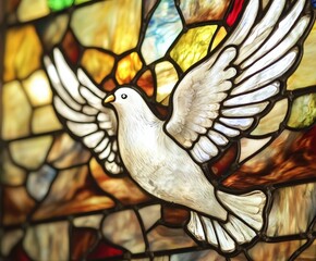 A stained glass depiction of the Holy Spirit soaring with grace