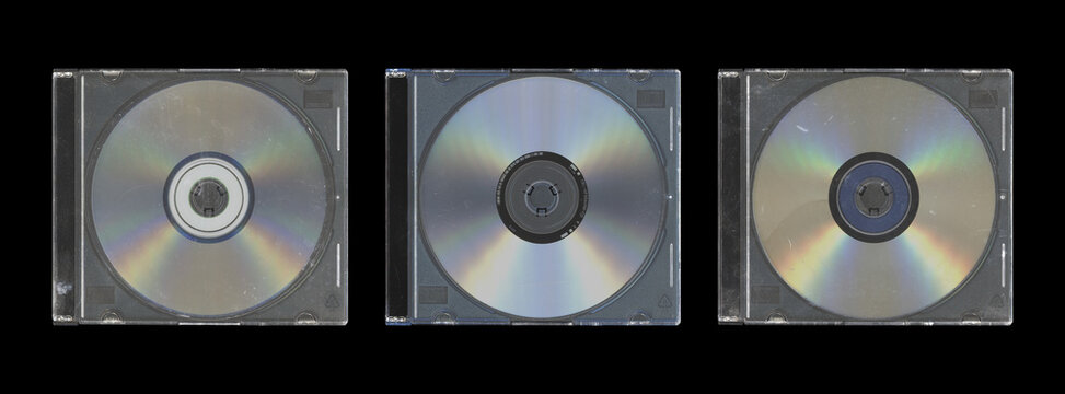 Set of three old music CD disc jewel case with compact disk and without cover in black background, y2k style