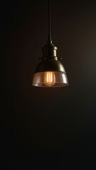 Obraz premium Vintage industrial pendant light glowing in dark