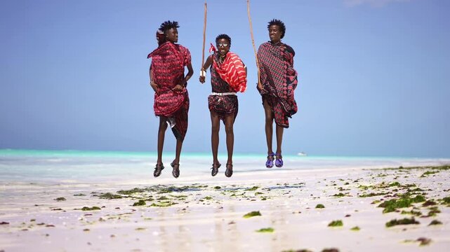 Portrait of Maasai man, traditional outfit, African warrior tribesman on beach. Tropical island beach in Tanzania. tourism destination in Africa. 