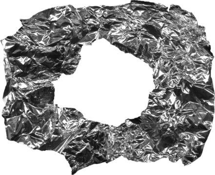 piece of crumpled shiny metallic paper with multiple shapes and cuts