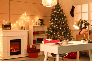 Cup of cacao, cookies and decorations on table with Christmas tree in room decorated for holiday at night