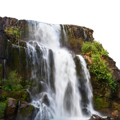 Obraz premium Waterfall cascading down rocks