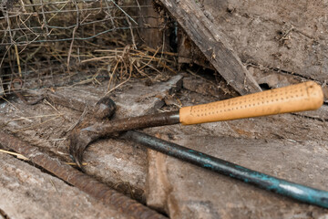 Fototapeta premium Rustic Tool Arrangement in a Weathered Barn Setting