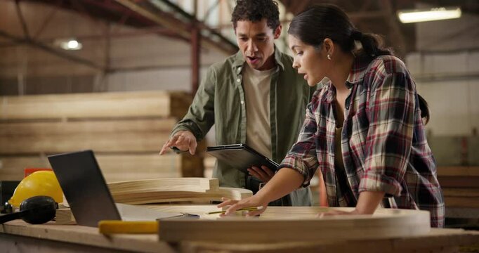 Carpentry, tablet and business people with laptop in factory for building plan, research or consulting. Industry, manufacturing and carpenter team online with digital, search or wood production idea