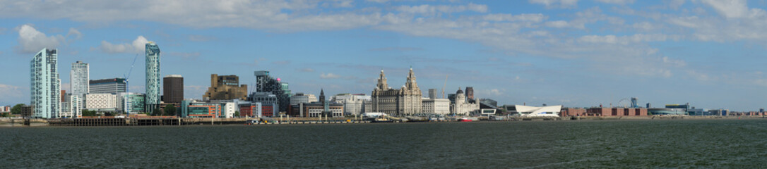 View From Mersey River To The Liverpool Pier England Great Britain On A Beautiful Summer Day With A Clear Blue Sky