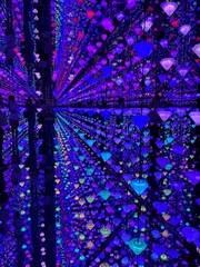 Infinity Room of Light and Color: An immersive art installation featuring hanging LED or...