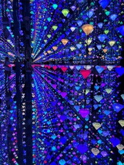 Infinity Room of Light and Color: An immersive art installation featuring hanging LED or crystal-like lights reflected in mirrored walls, creating a kaleidoscope of vibrant, infinite geometric pattern