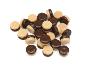 Caramel candies isolated on white background