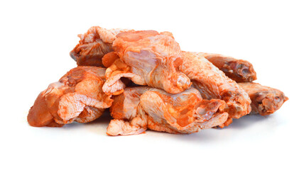 Raw chicken meat with bone on a white background