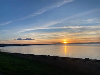 Obraz premium sunset over the river