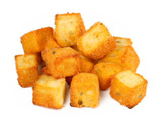 fried crispy breads cubes on a white background