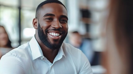 Obraz premium Smiling Man in Office Setting
