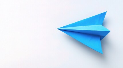 Fototapeta premium Blue Paper Airplane on White Background