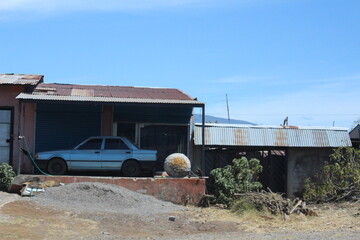 Old Car parked under shack