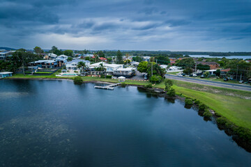 The photo shows a lakeside view located in Ken Lambkin Reserve