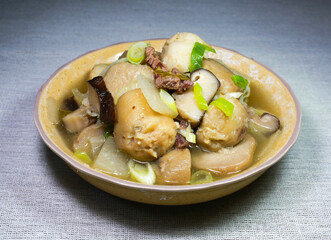 Close up of Korean food boiled Taro soup with beef and shiitake mushrooms in a bowl, South Korea