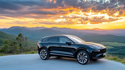 Naklejka premium Sleek Black SUV Against Stunning Sunset Landscape