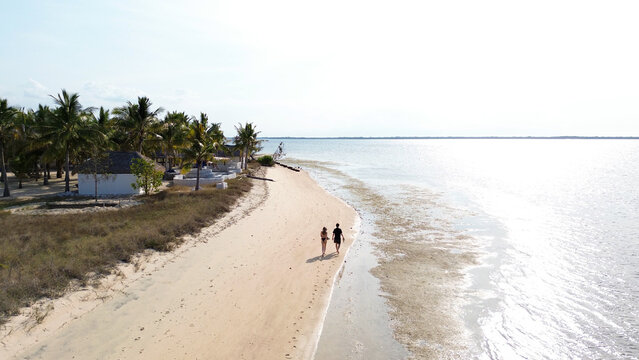 Small island Pulau Bedil, tropical island in Indonesia. Drone view.