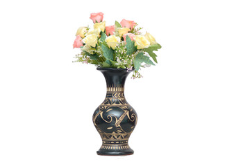 The vase is adorned with a bouquet of colorful roses, adding a touch of elegance and beauty.