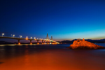 Dawn view of Chilsan Bridge on the sea at Doripo Port near Muan-gun, South Korea