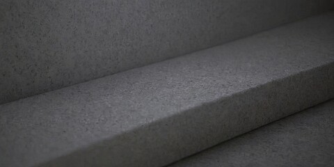 A gray staircase with a gray step