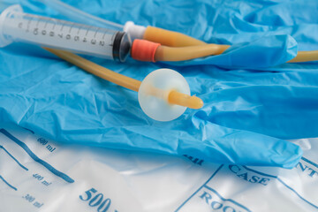 Foley catheter and urine drainage bag collect urine for disability or patient in hospital.