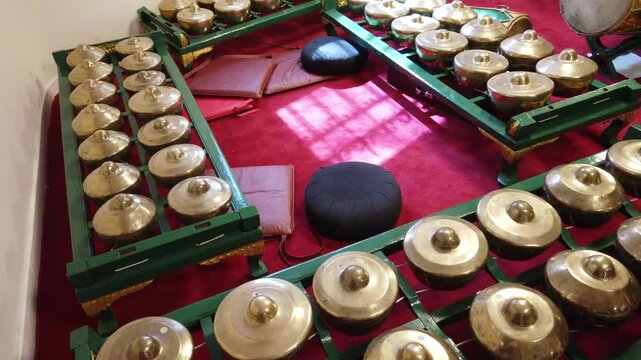 Bonang Bronze Percussion Gamelan Instruments displayed at Indonesian orchestra