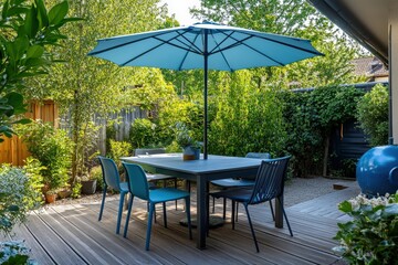 Cozy outdoor dining area with blue umbrella and furniture