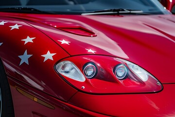 Close-up of the headlight of a red vintage car