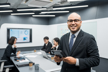 Asian business people team analyzing statistics financial. Group Team of ceo business man and woman Meeting Conference Discussion various topic. Executive professional managers Corporate in office.