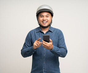 Young rider man wearing safety helmet before riding the motorcycle. Safety ride.