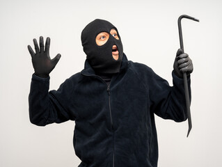 Thief in uniform black jacket various pose on isolated background. The Robber terrorism criminal...