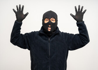 Thief in uniform black jacket various pose on isolated background. The Robber terrorism criminal escapes with balaclava and crowbar entering a house for stealing Housebreak