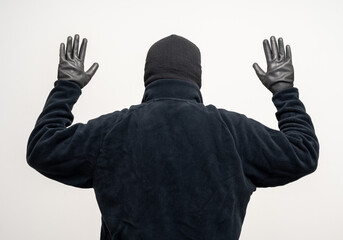 Thief in uniform black jacket various pose on isolated background. The Robber terrorism criminal...