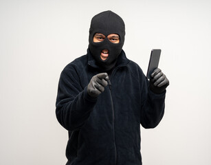Thief in uniform black jacket various pose on isolated background. The Robber terrorism criminal...