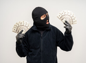 Thief in uniform black jacket various pose on isolated background. The Robber terrorism criminal...