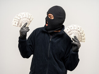 Thief in uniform black jacket various pose on isolated background. The Robber terrorism criminal...