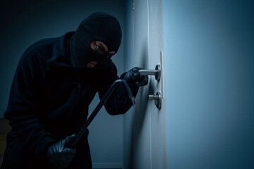 Thief in uniform black jacket various action housebreak. The Robber terrorism criminal escapes with...