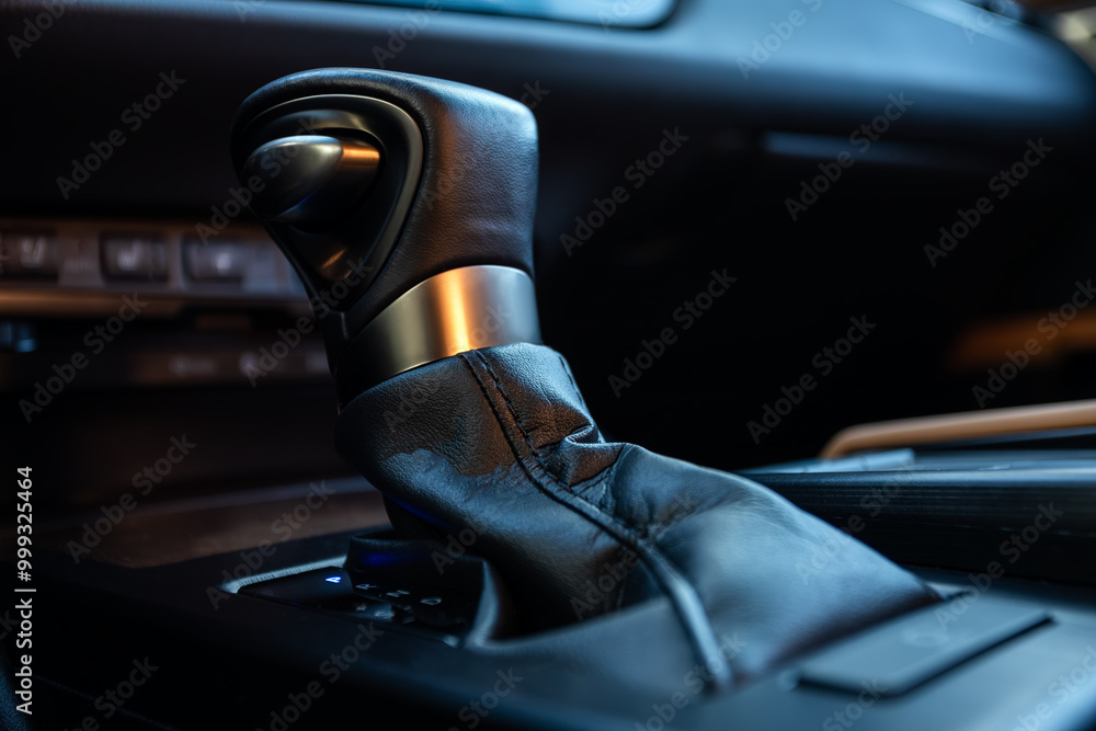 Poster close up of the manual gearbox transmission handle. accelerator handle and buttons in a new car.