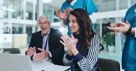 Woman, doctors and applause with laptop in hospital office for cheers, goal and breakthrough with monkeypox update. People, group and success by pc with diversity, good news and scrum for celebration - Powered by Adobe