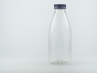 Transparent PET bottle isolated on white background