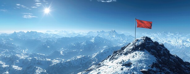 A majestic mountain peak adorned with a vibrant red flag, showcasing stunning snowy landscapes and a bright blue sky.