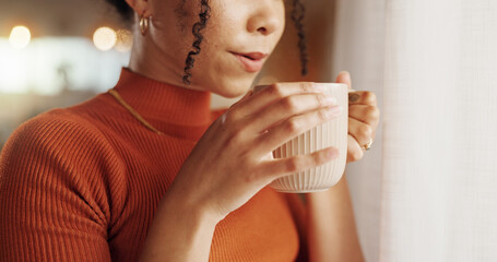Coffee, hands and warm with woman closeup in living room of home for morning beverage or caffeine....